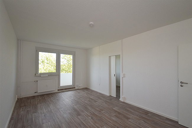 Wohnzimmer: 2-Raum-Wohnung Kolkturmring 13