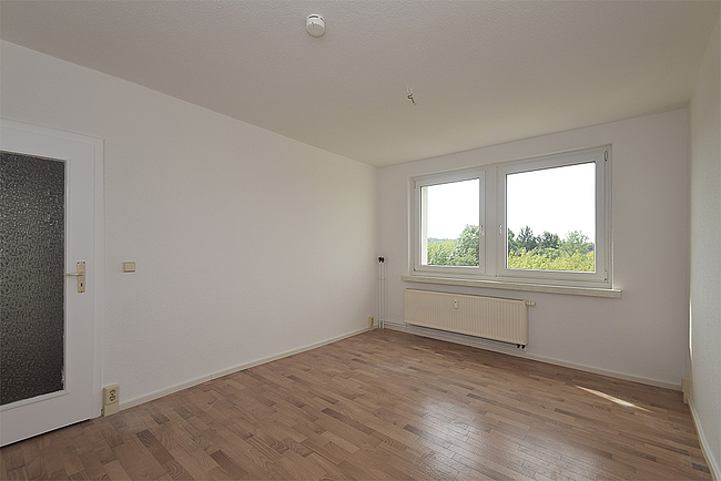 Schlafzimmer: 2-Raum-Wohnung Plutostraße 4