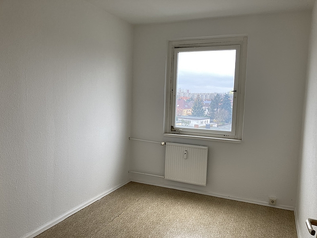 Schlafzimmer: 3-Raum-Wohnung Am Rosengarten 83a